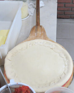 baking pizza in the wood oven